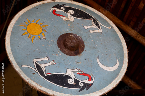Viking shield with Sköll and Hati, the wolves who chase the sun and moon