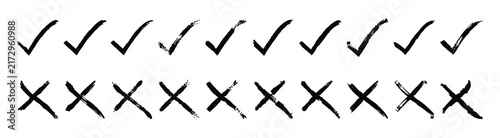 Hand drawn check mark and cross mark vector set isolated on white background. Grunge ink check mark and wrong cross symbol collection for survey and test. Vector illustration.
