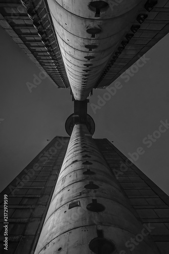 BELGRADE, SERBIA - AUGUST 24, 2026: Low angle view of the famous Genex Tower, a classic brutalist concrete skyscraper under a clear sky in New Belgrade.