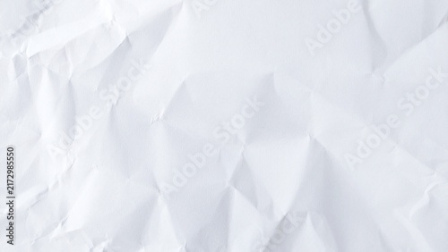Blank clean white paper sheet background texture. Old crumpled and wrinkled white paper surface. Abstract empty white paper background.