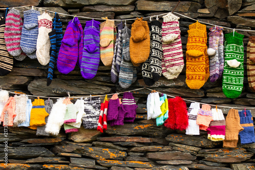 Traditional Tushetian knitted wool socks from the mountain region of Georgia, featuring intricate patterns, warm natural wool