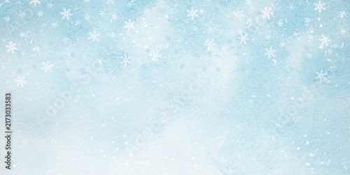 A blue watercolor background with falling snow for designing winter holiday web banners