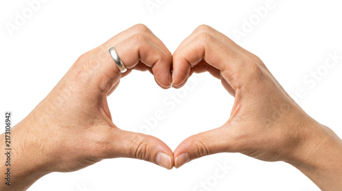 Fotografía Hands forming heart shape with silver wedding ring on transparent background
