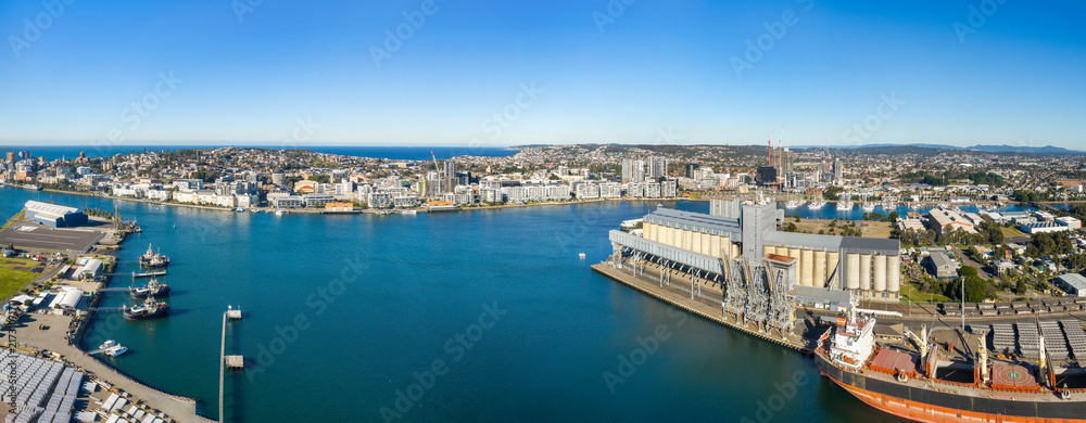Fototapeta premium Aerial Newcastle Port docked ship city panorama