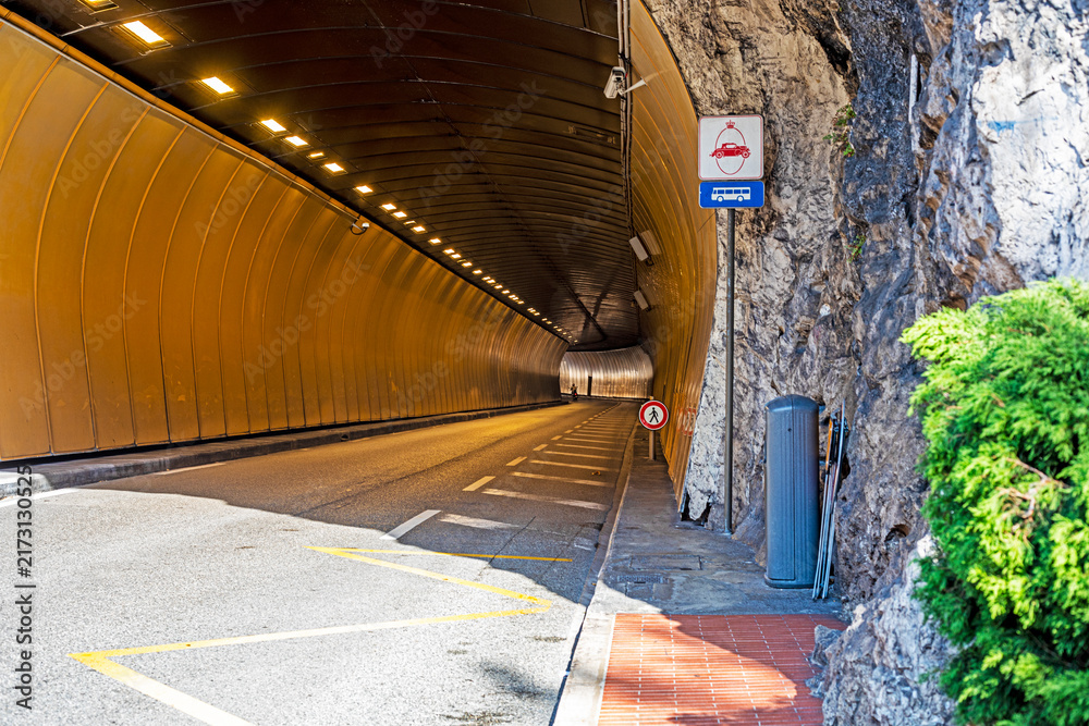 Naklejka premium Illuminated underground highway tunnel in Monaco for auto racing