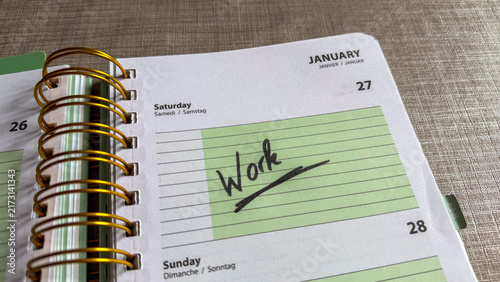 Work on Saturday in Weekly Planner Showing Weekend Work Concept