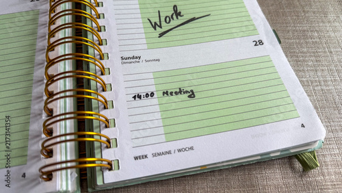 Weekend Work and Sunday Meeting Written in Planner