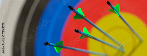 Obraz na płótnie Multiple arrows hitting the bullseye on an archery target, symbolizing success