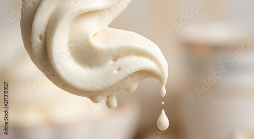 Vanilla Cream Dripping with Droplets, Creamy Swirl Texture Close Up