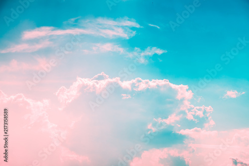 Colorful sky forming a soft background with fluffy pastel clouds, creating a serene and ethereal natural atmosphere perfect for dreamy designs and tranquil concepts