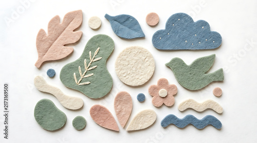 Set of decorative felt shapes with nature and sky icons