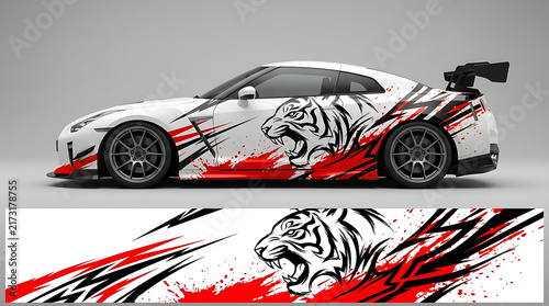Aggressive sports car with dynamic tiger graphic wrap, showcasing high-performance automotive styling and bespoke design