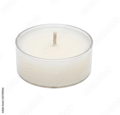 Konstfotografi Small white tea light candle in a clear plastic container isolated on white