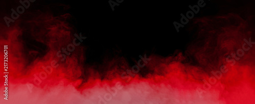 Abstract red smoke rising against a dark black background, creating a dramatic atmospheric texture for backgrounds, overlays, banners, cinematic designs, creative projects, and visual effects.