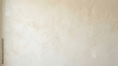 Obraz na płótnie Textured off white plaster wall background with subtle beige tones.