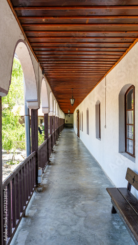 Obraz na plátne Covered arched corridor in historic building