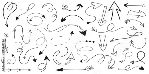 Collection of hand drawn arrows and doodle sketches isolated on a plain white background