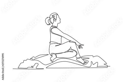 Woman meditating doing yoga on a rock.Mental health concept.Single line draw design.Vector graphic illustration