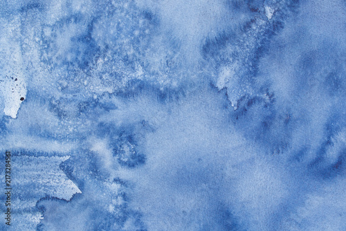 blue watercolor background painted on paper texture