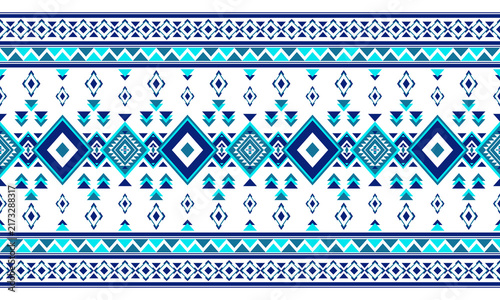 Blue geometric tribal pattern with traditional ethnic ornament on white background.
