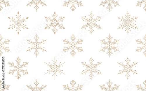 Seamless pattern with decorative golden snowflakes