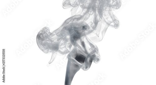 Foto Wispy ethereal smoke swirls rising and dissipating against a clean white backgro