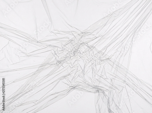 Wrinkled transparent plastic film texture isolated overlay.