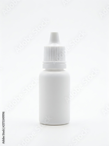 Small plastic dropper bottle for medicine or essential oil isolated on white background