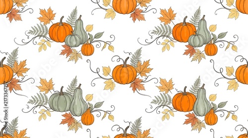 Seamless pattern with pumpkins, gourds, and autumn leaves isolated on white background