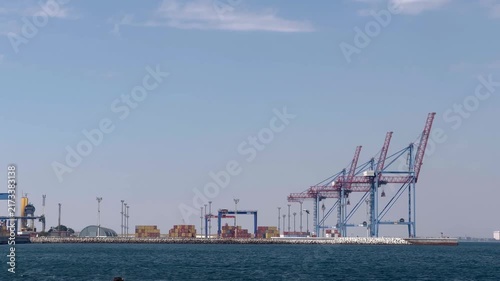 seaport with cranes and containers