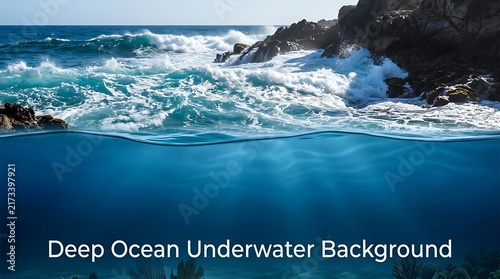 Deep turquoise ocean underwater background. Waves crashing against rocks. Over-under water perspective.