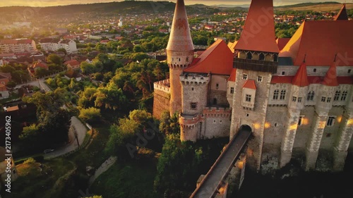 Castelul Corvininlor – Transylvanian Historic Castle at Sunrise aerial view, important medieval gothic landmark in Hunedoara, Romania