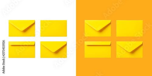 Konstfotografi Bright yellow envelopes arranged on white and orange split dual tone backdrop tr