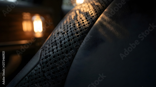 Perforated leather car upholster isolated on clean surface for modern