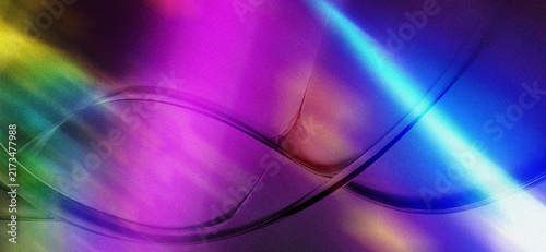 Фотография Abstract neon light streaks with vibrant rainbow colors and glowing digital grain texture