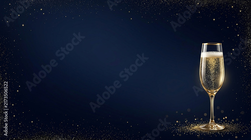 Champagne glass on a dark blue background with gold glitter for New Year celebration and party