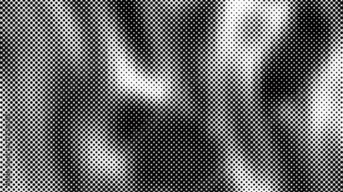 Abstract monochrome halftone pattern with varying dot density and gradient effect transparent background
