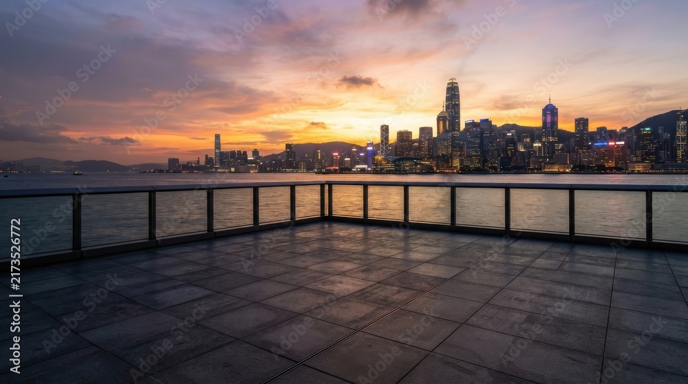 Naklejka premium Modern observation deck with city skyline view at sunset