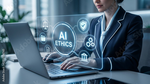 Professional Woman Working On Laptop With AI Ethics Concept Displayed