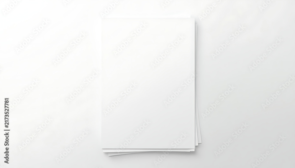 Fototapeta premium Blank white notebook or sketchbook with a spiral binding lying flat on a clean surface