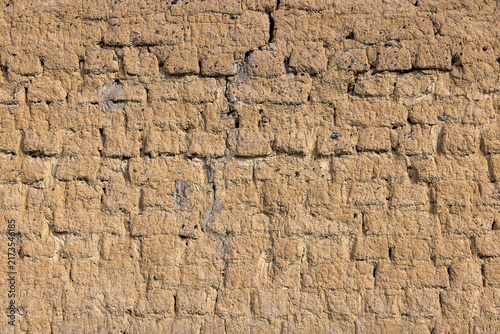фотографія Textured Earth Brick Wall Background