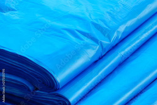 Automatic polyethylene plastic bag production machine. Close-up of roller of plastic bag production machine. product packaging concept
