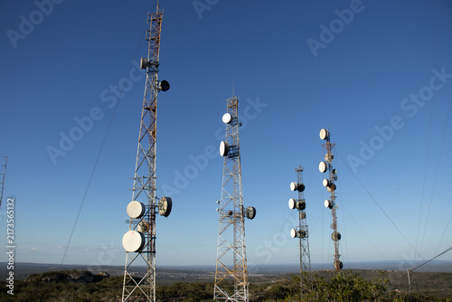 Cuadro en lienzo View of a transmission and telephone network with a city in the background