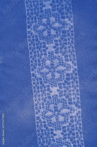 Cyanotype laces illustration. Handcrafted using traditional sun print techniques, featuring delicate and intricate lace textures in classic Prussian blue tones
