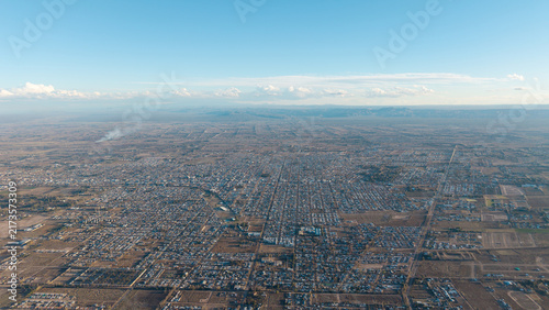 High angle wide aerial establishing shot of San Rafael town in Cuyo region Argentina