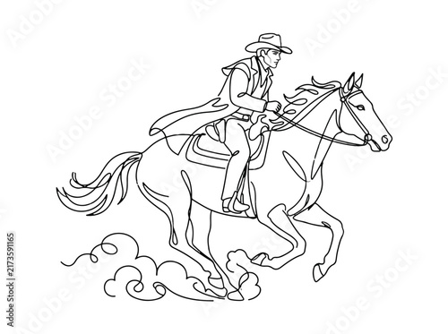 Cowboy riding galloping horse in action scene