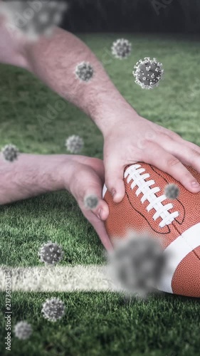 Animation of falling covid 19 cells over american football player