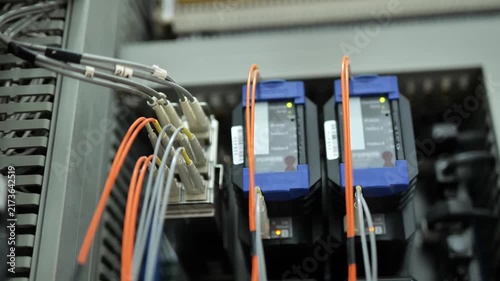 Optical fiber converter device processing and transmitting communication signals through fiber optic cables, representing reliable data transfer, digital networking, telecommunications infrastructure,