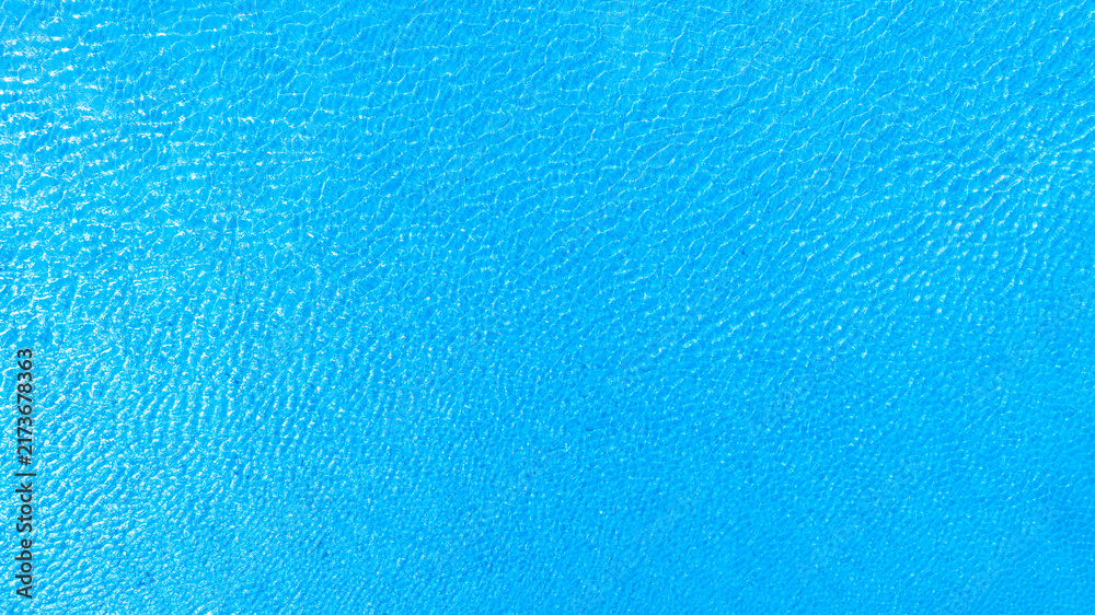 Obraz premium Top view of deep blue sea water surface with small ripples, aerial drone shot of turquoise ocean texture at island , abstract nature background 