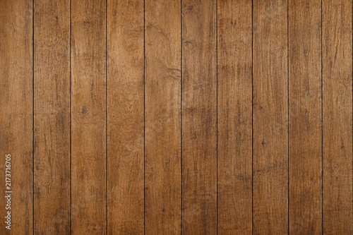 Fotografía Natural teak slatted wood texture with warm brown tones, visible grain, and evenly spaced lines, ideal for furniture, wall panels, flooring, and interior design backgrounds